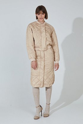 Фото модного лео костюм с юбкой стежка бежевый сезон 2020 года