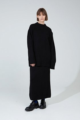 Фото модного агва костюм джемпер с юбкой черный сезон 2020 года