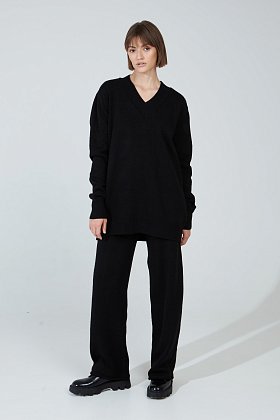 Фото модной одежды - агва брюки свободные черные сезон 2020 года