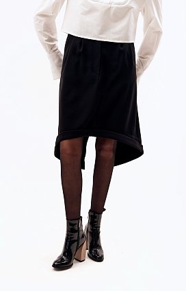 Фото модной одежды - тимбра юбка с манжетом черная сезон 2020 года